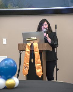 Stephanie May speaks at the 2023 ENMU-R Phi Theta Kappa Induction Ceremony