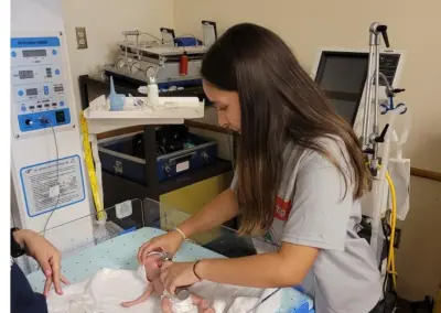 Young students participate in various activities hosted by the Eastern New Mexico University - Roswell Health Sciences Center in an effort to gauge interest in a potential career path in healthcare, emergency services, and medicine.