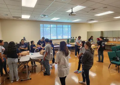 Young students participate in various activities hosted by the Eastern New Mexico University - Roswell Health Sciences Center in an effort to gauge interest in a potential career path in healthcare, emergency services, and medicine.