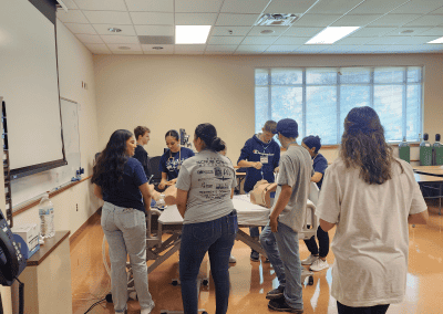 Young students participate in various activities hosted by the Eastern New Mexico University - Roswell Health Sciences Center in an effort to gauge interest in a potential career path in healthcare, emergency services, and medicine.