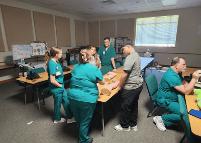 Young students participate in various activities hosted by the Eastern New Mexico University - Roswell Health Sciences Center in an effort to gauge interest in a potential career path in healthcare, emergency services, and medicine.